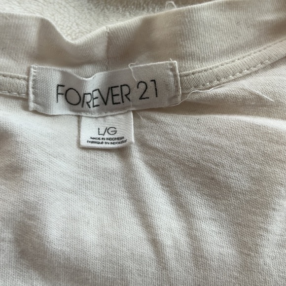 Forever 21
Color: Cream
Type: Cardigan 
Size: Large - Picture 2 of 3